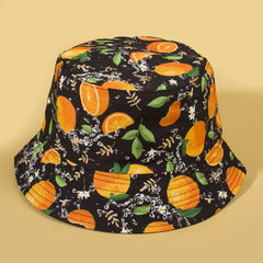 Sombrero Bucket Doble Vista reversible con estampado de cítricos y reverso color negro.