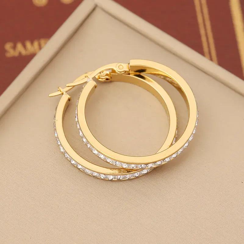 Aretes Lumen Doré – Aretes Dorados con Zirconia Resistentes al Agua | A la Braschi