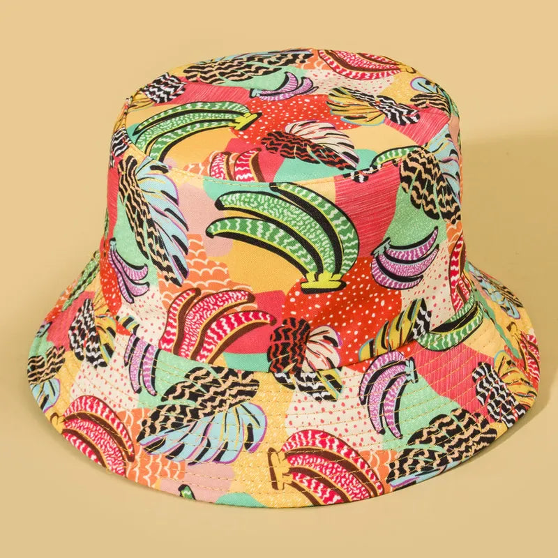 Sombrero Bucket Doble Vista reversible con estampado de bananas y reverso color negro.