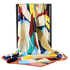 detalle de panoleta satinada multicolor con estampado geometrico moderno