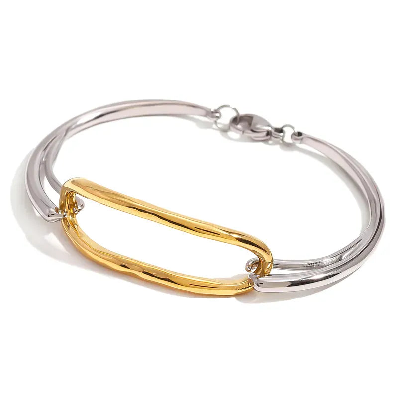 vinculo-pulsera-bicolor-dorada-plateada-fondo-blanco
ALT: Pulsera Vínculo bicolor dorada y plateada de acero inoxidable sobre fondo blanco